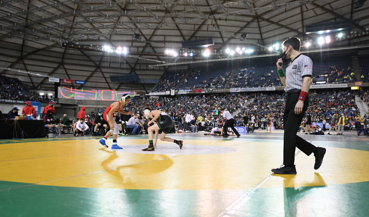 Wrestlers compete at the 2022 Mat Classic in Tacoma, Washington, an all-classification state championship meet that has long taken place at the Tacoma Dome.