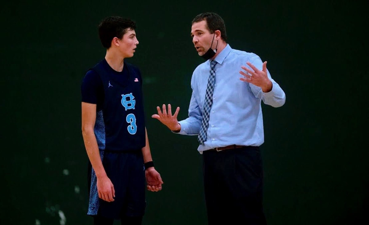 Gig Harbor boys basketball coach Billy Landram talks to son, Will