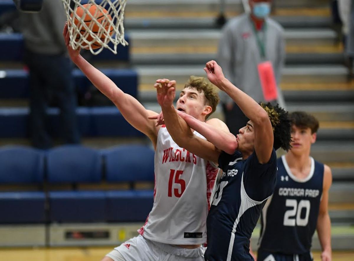 Quin Patterson takes it to the rim for Mount Si in Class 4A regional-round game against Gonzaga Prep