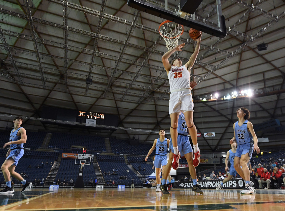 The Kamiakin forward lays the ball in during a first round Class 4A state tournament win over 12-seed Central Valley in the Tacoma Dome.