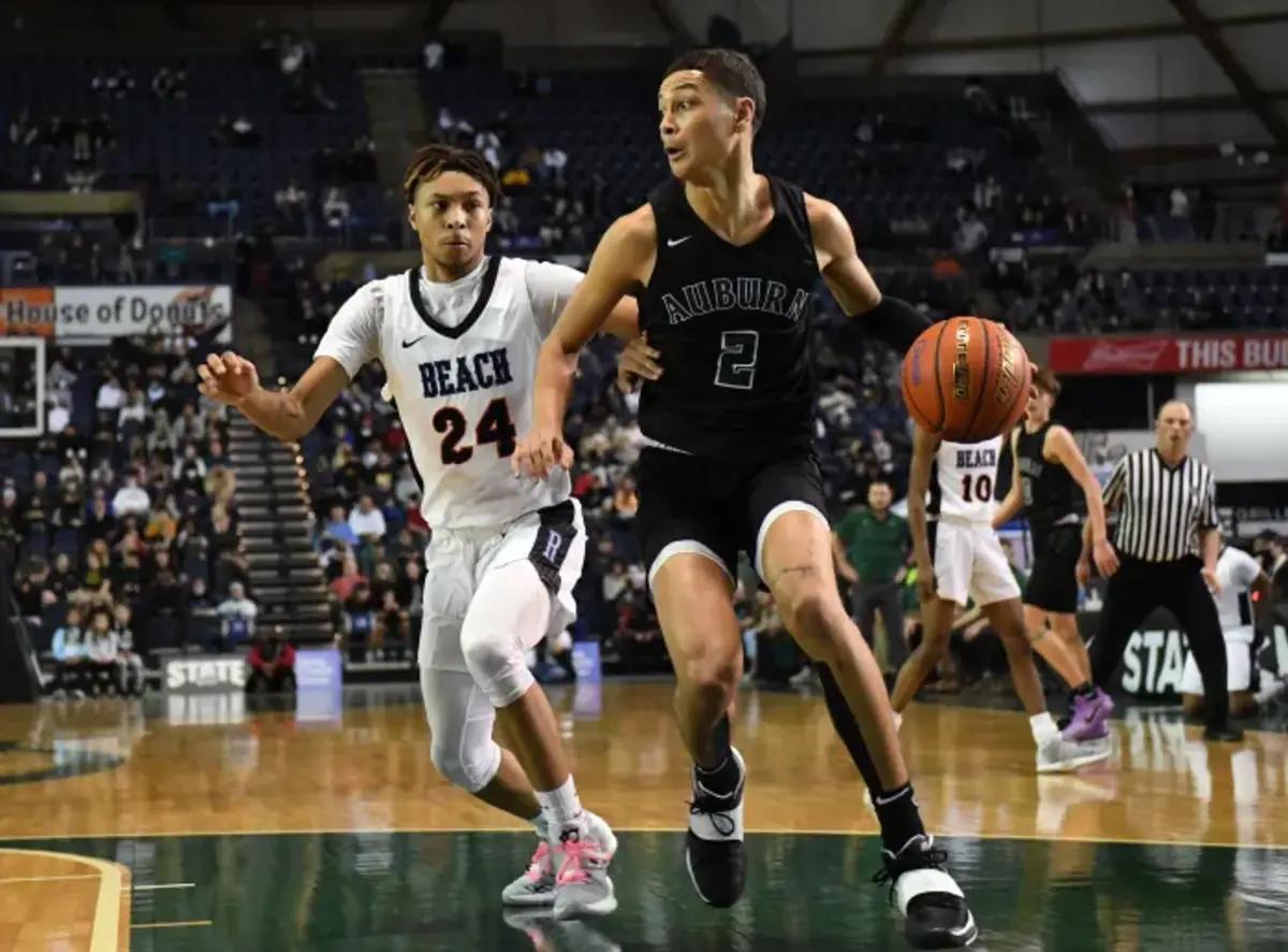 Blassingame, a 6-foot-5 senior guard, advances the ball in. the Class 3A state championship against 4-seed Rainier Beach. The 2-seed Trojans ended up winning the state title.
