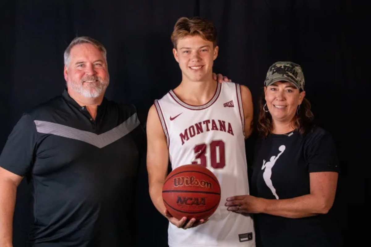 Jaxon Nap poses with his parents during an official visit to Montana in 2021. The senior led Hazen and made an impact against 3A KingCo defenses.