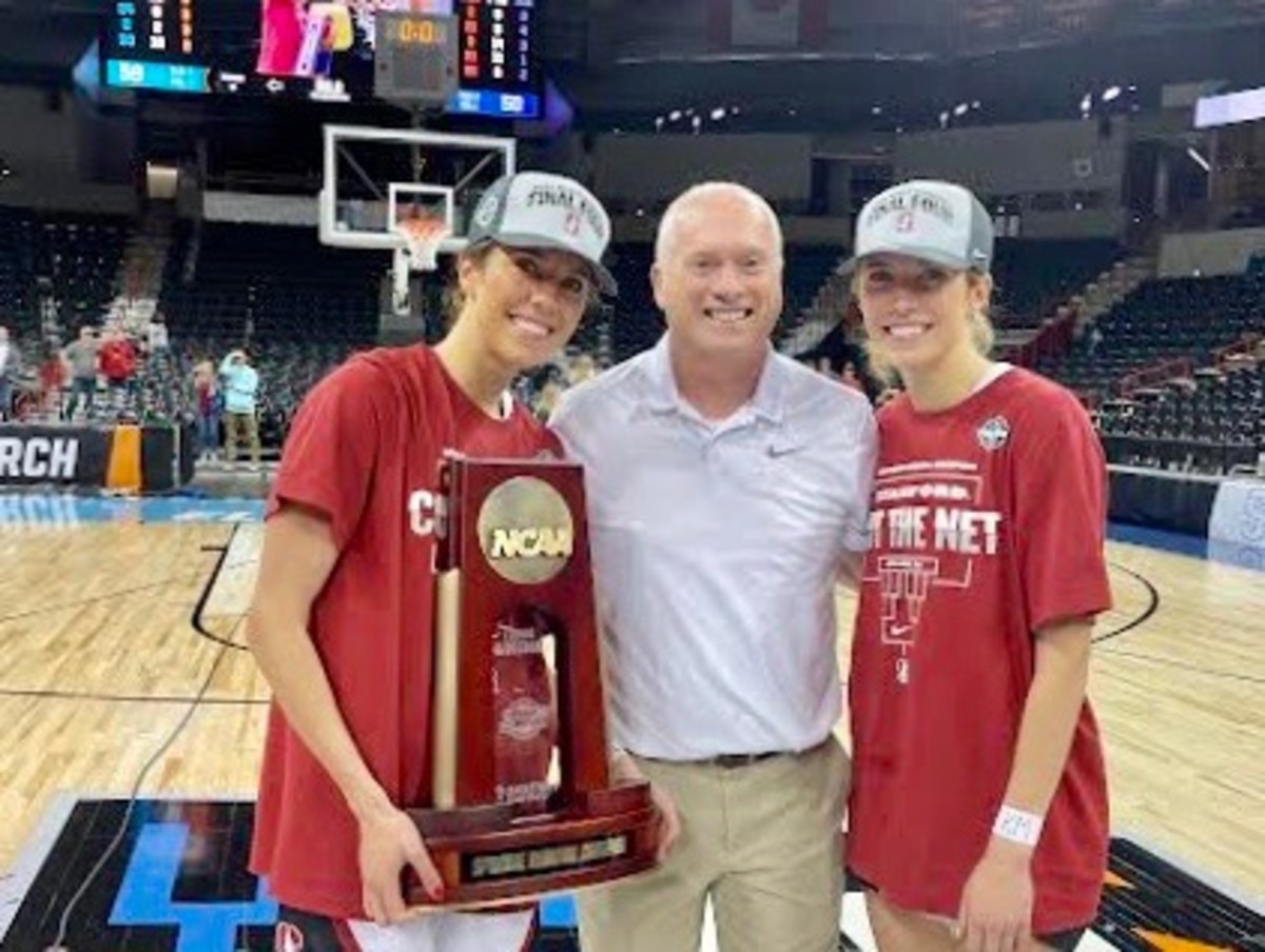 Ex-Central Valley girls coach Freddie Rehkow and the Hull sisters after the NCAA West Regionals in Spokane