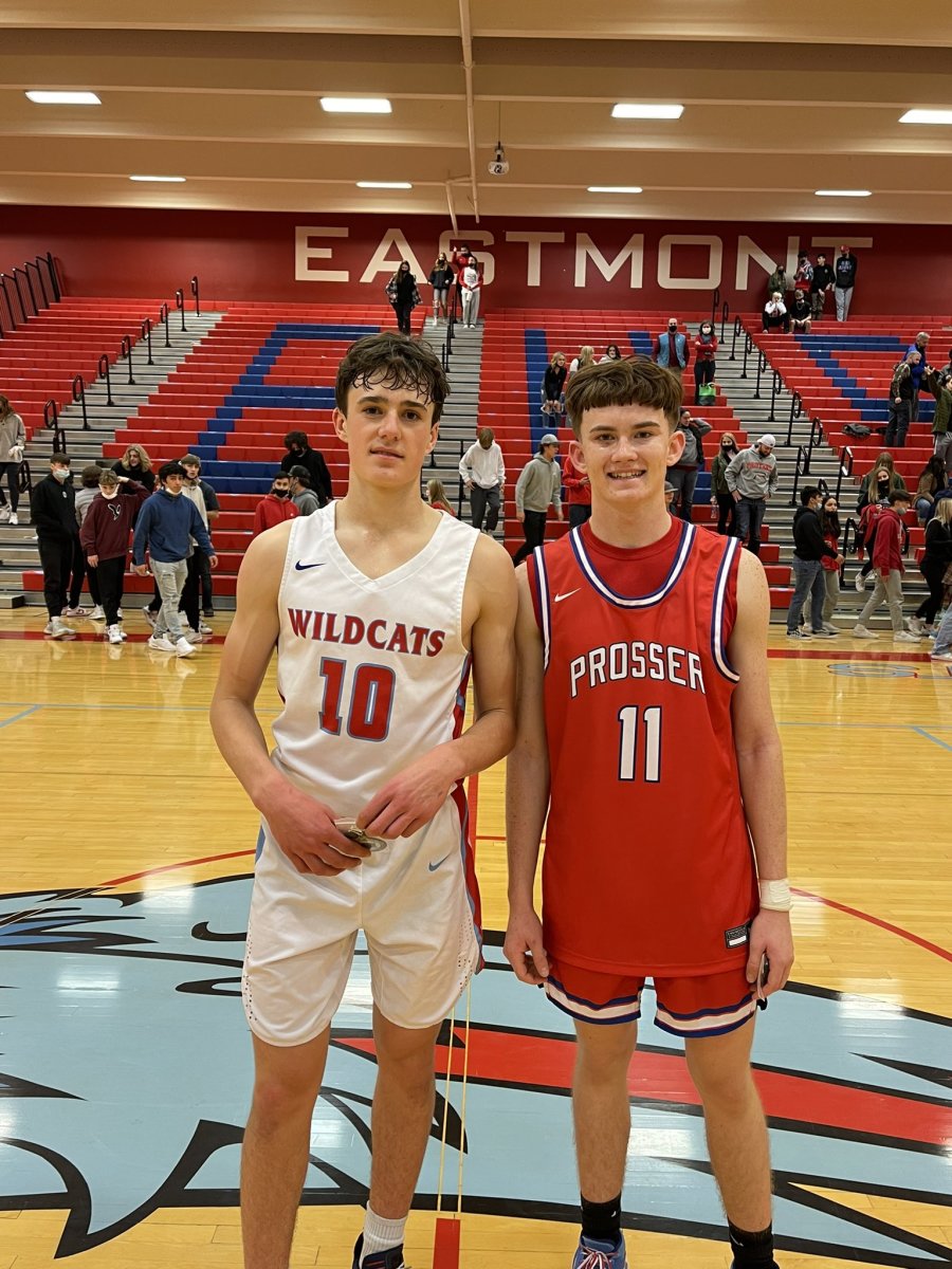 Monahan (left) poses postgame with Kory McClure of Prosser after winning a sportsmanship award at Eastmont's Winter Shootout.