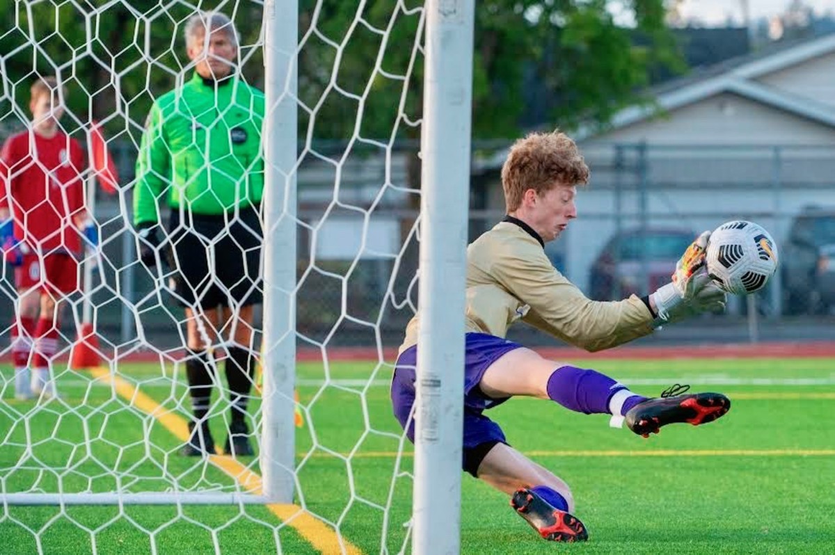 Puyallup senior goalkeeper Nathan Vitzthum makes a shootout save against Union in the Class 4A West Central/Southwest District championship match. Viks won in 16-round shootout.