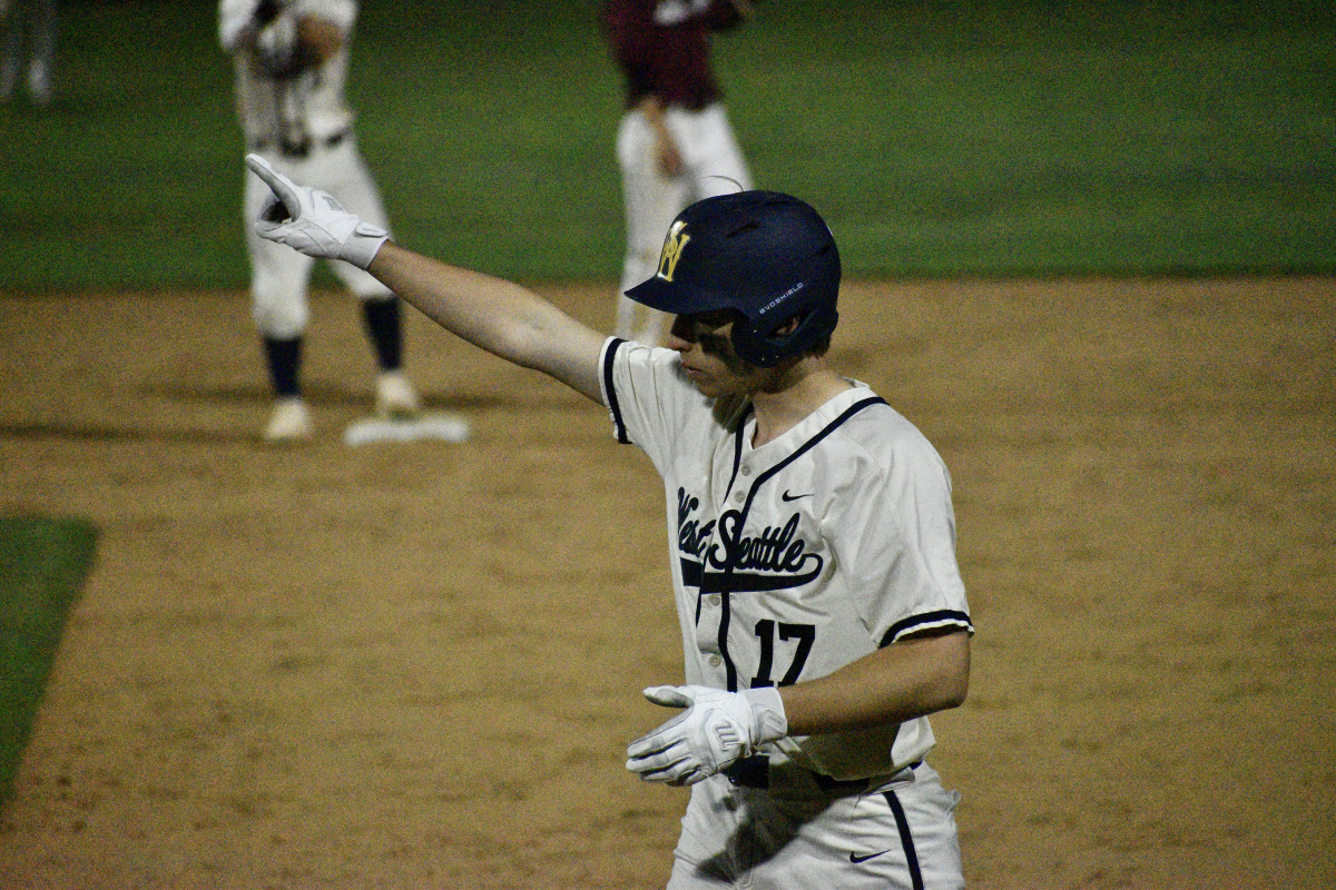 Sophomore Matthew Henning drives a single to right field in the bottom of the seventh during top-seeded West Seattle's final comeback attempt.
