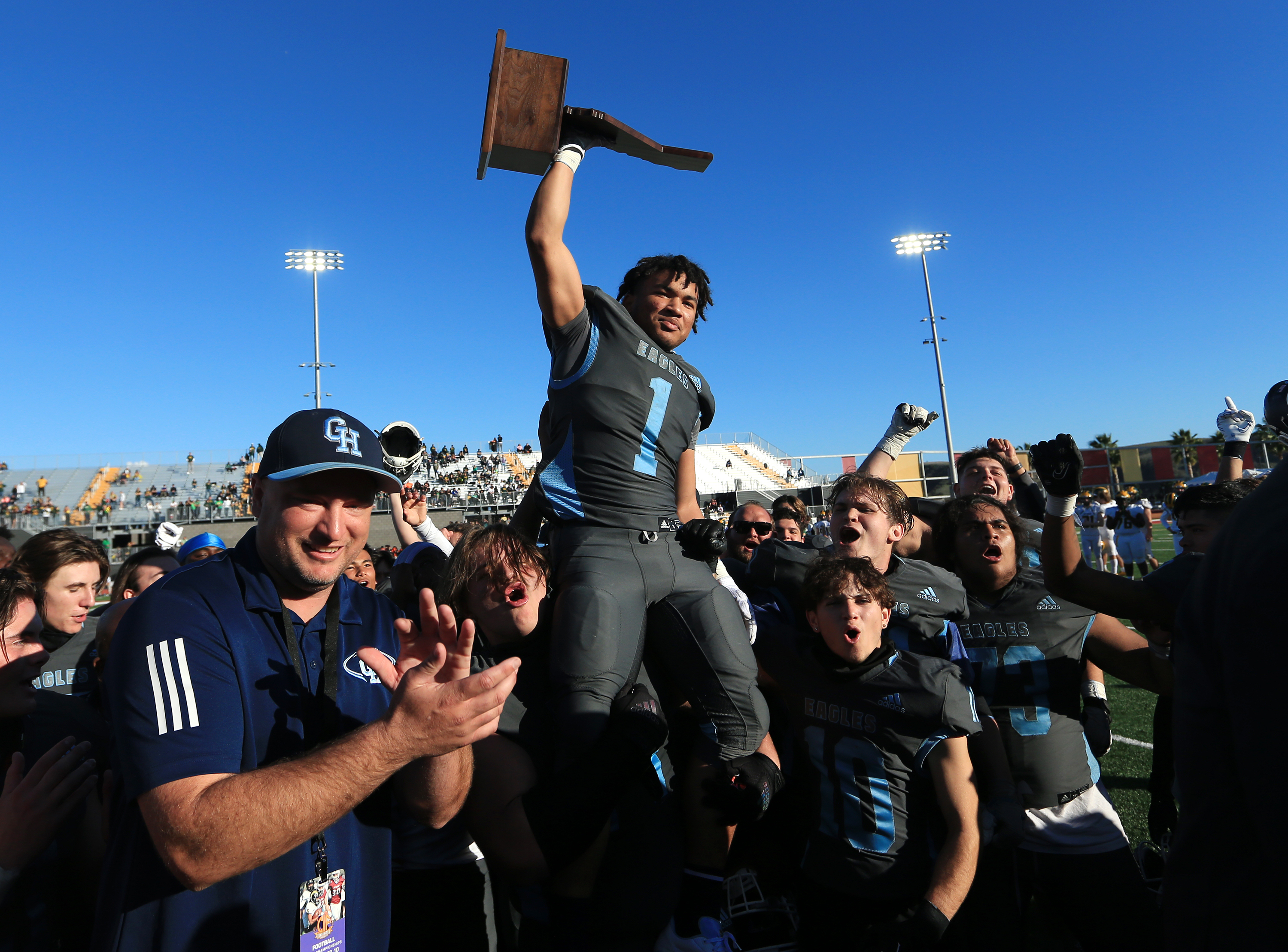 Granite Hills celebrates school's first state title and sixth by a San Diego Section school at Saddleback College in the last two seasons. Photo: Todd Shurtleff