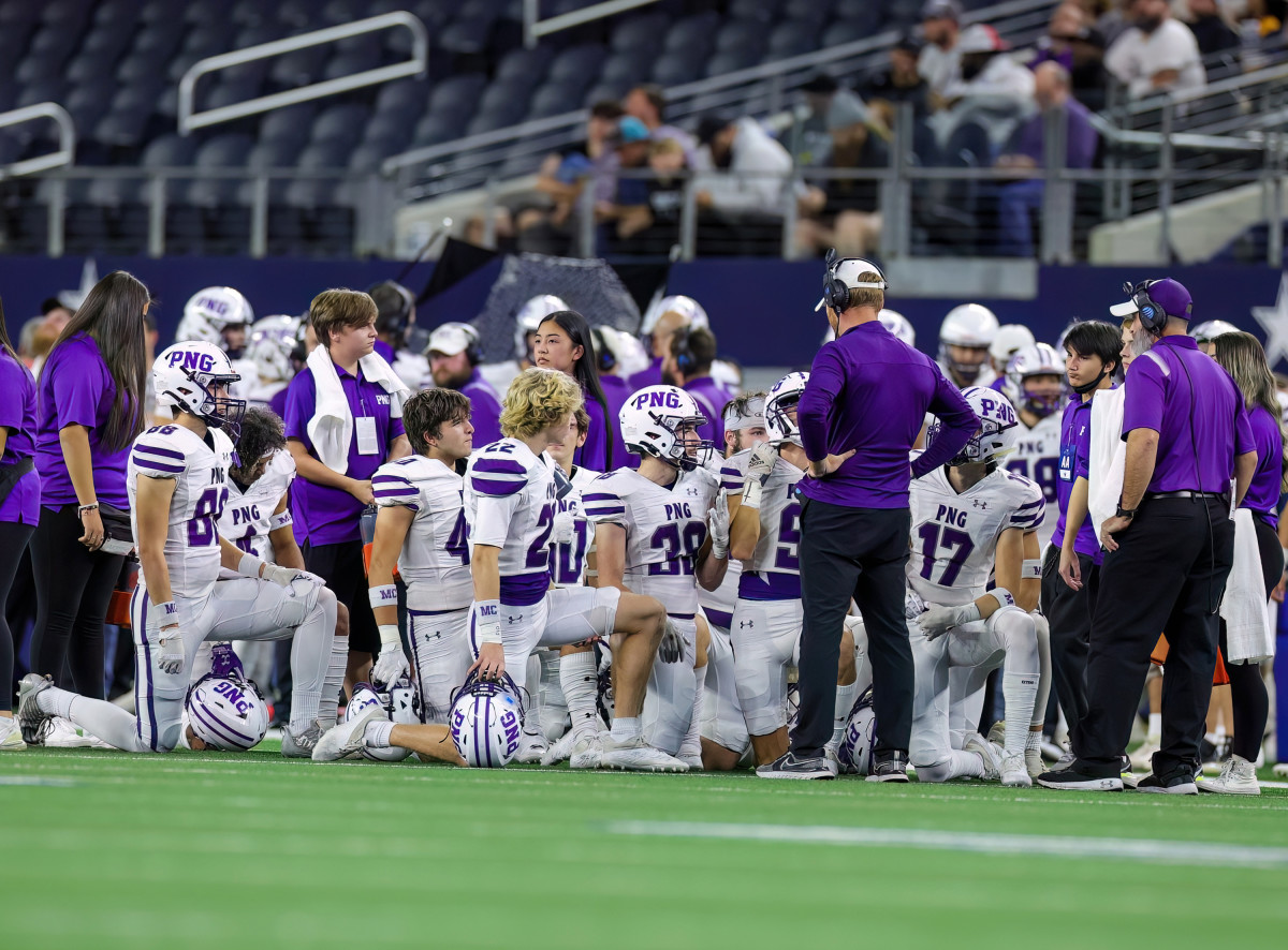 Port Neches Groves huddles at the 2022 state championship.