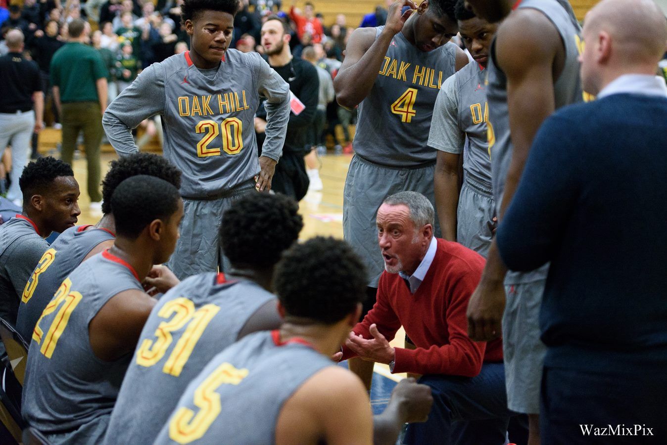Steve Smith coaches Oak Hill during a timeout in 2015. His teams have won a tournament-record seven LSI titles.