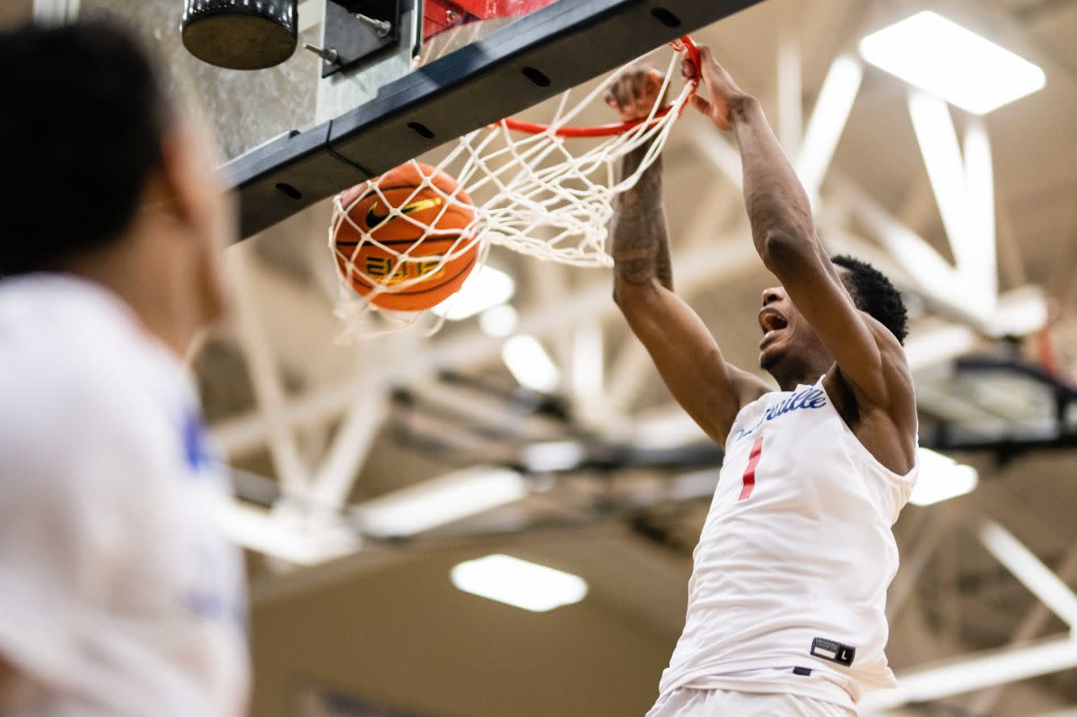Ron Holland throws down a dunk for then-national No. 1 Duncanville during the Les Schwab Invitational in Dec. 2022 in Portland, Oregon.