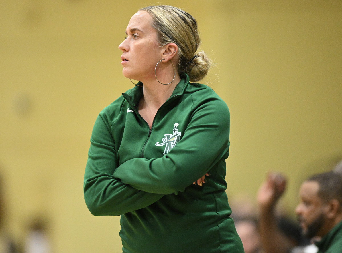 St. Vincent-St. Mary girls basketball head coach Carley Whitney watches on during a game against Ursuline on January 18, 2023. Photo credit: Jeff Harwell