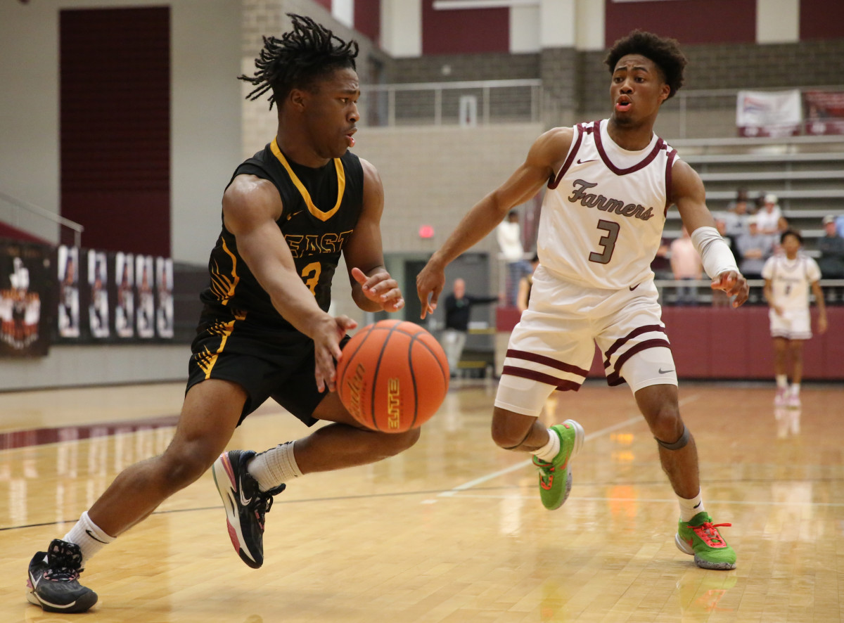 Plano East's Isaiah Brewington drives baseline in a 2023 matchup against Lewisville. The guard has been a crucial piece in the Panthers' undefeated 2023-24 season.