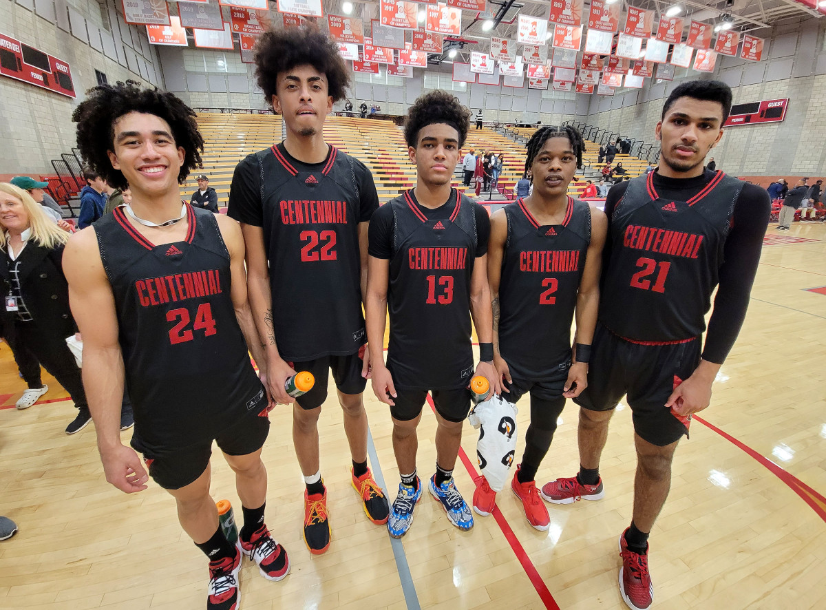 From L-R: Jared McCain (24), Devin Williams (22), Eric Freeny (13), Mike Price (2) and Aaron McBride (21) after Huskies defeated Liberty (Henderson, Nev.) at the Nike Extravaganza. Photo: Nick Koza