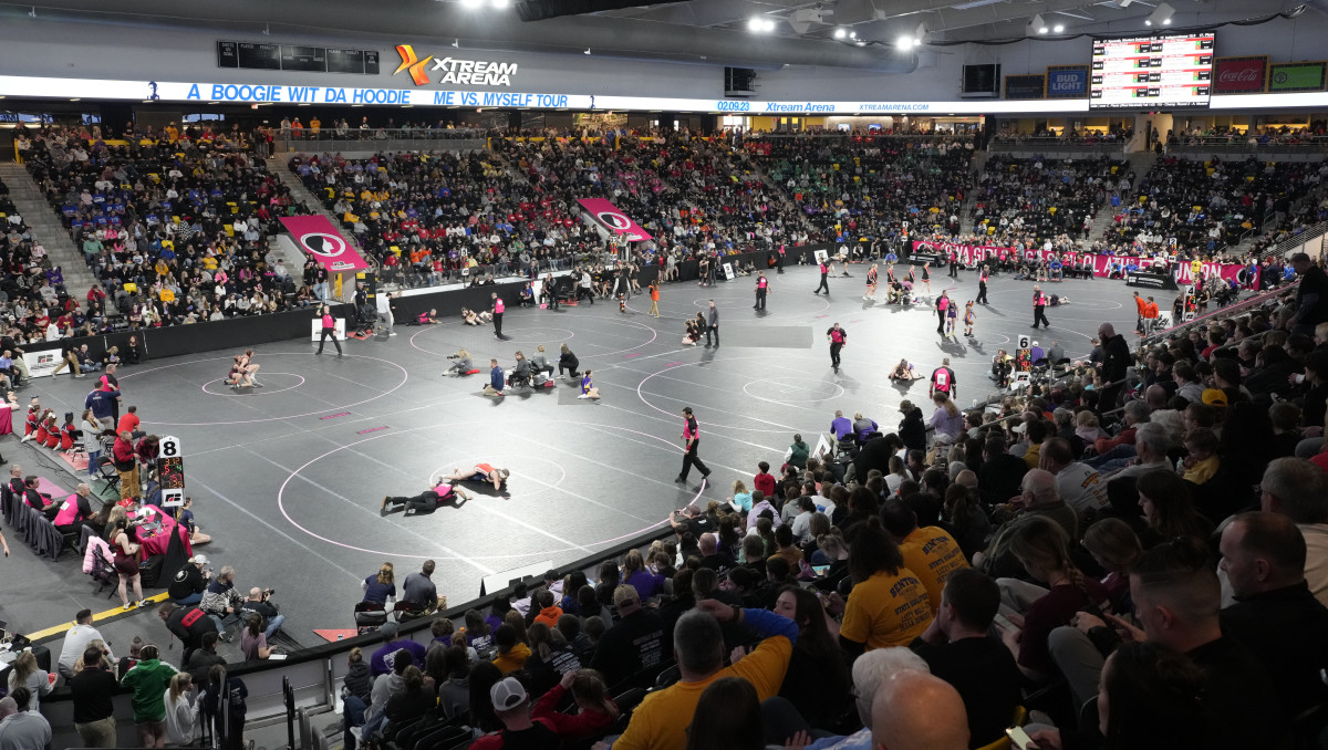 The first day of the inaugural IGHSAU girls state wrestling tournament was sold out Thursday at X-tream Arena in Coralville.
