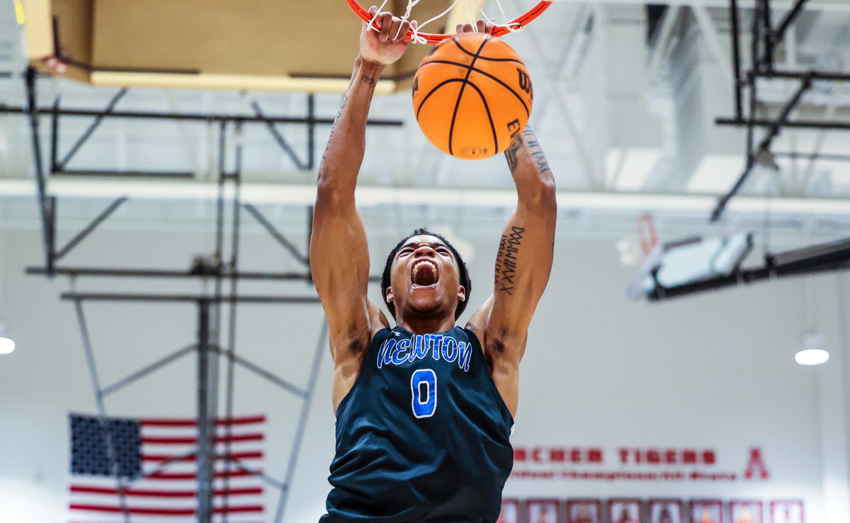 Newton's Jakai Newton lets out seven months of frustration, upon his return to the lineup following a knee injury, with an emphatic dunk. The 4-star Indiana commit scored 12 points, including six in the fourth quarter, to help the Rams win on the road at Archer.