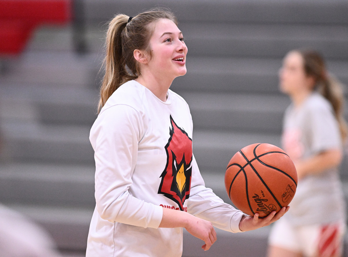 Loudonville's Corri Vermilya laughs during warmups prior to a game against Ellet on February 7, 2023.