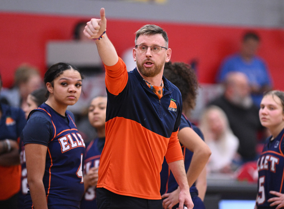 Ellet girls basketball coach Nick Harris yells out instructions during a game against Loudonville on February 7, 2023. Photo credit: Jeff Harwell
