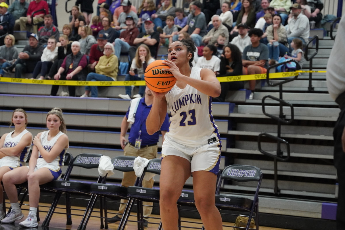 Center Kate Jackson dominated both inside and outside, knocking down three three-pointers to culminate an 18-point showing in her final regular season home game.