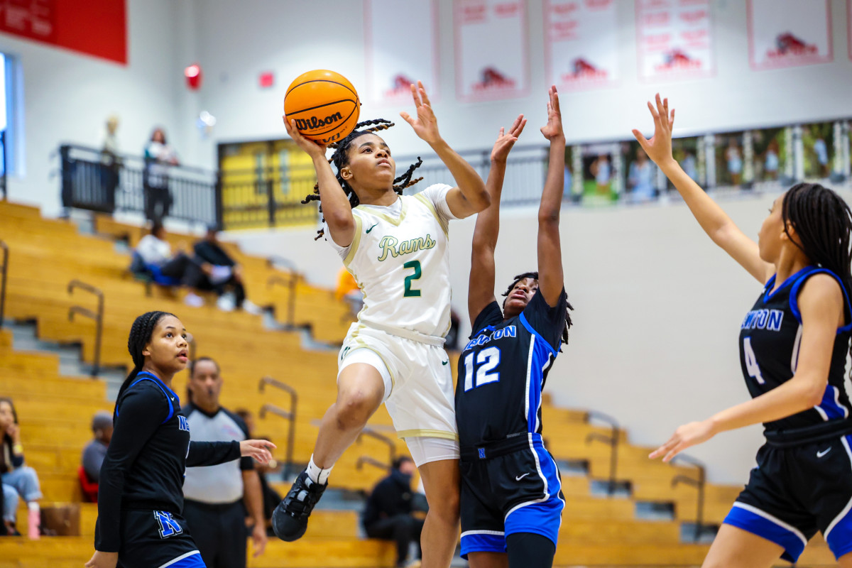 Grayson's Tatum Brown, one of the top sophomores in the state, floats just long enough to create the perfect angle for her shot. She tied teammate Samara Saunders for game high scoring honors, each finishing with 22 points.