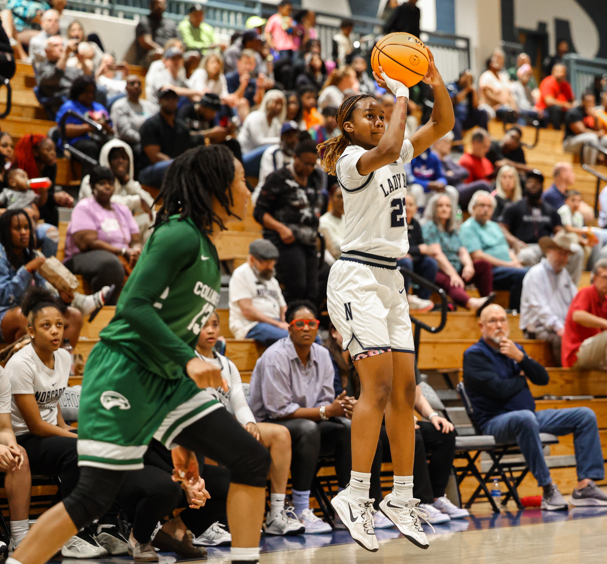 Norcross' Jania Jenkins, who led the Blue Devils with 25 points, releases a shot from the wing.