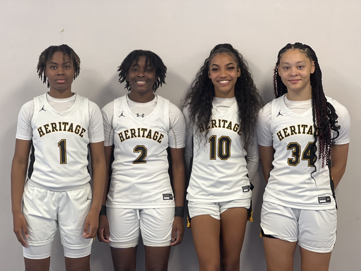 (From left) Teriyah McFadden, Arielle Facyson, Sydni Studesville and Jasleen Green enjoyed the moment after the Patriots earned their spot in the 5A state finals with a big win over Clearwater.