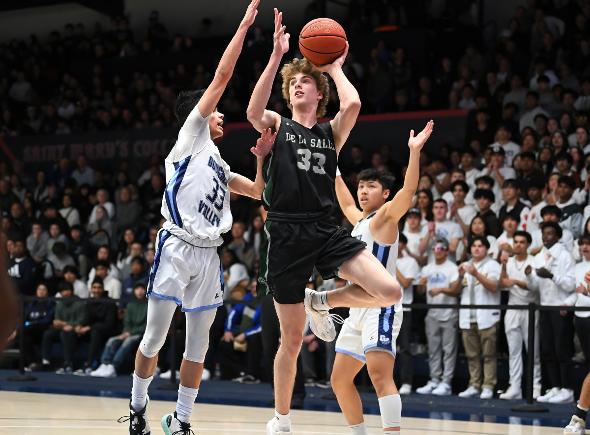 Alec Blair going up in the 2023 CIF NCS Open Division championship playoff game against Dougherty Valley at St. Mary's College