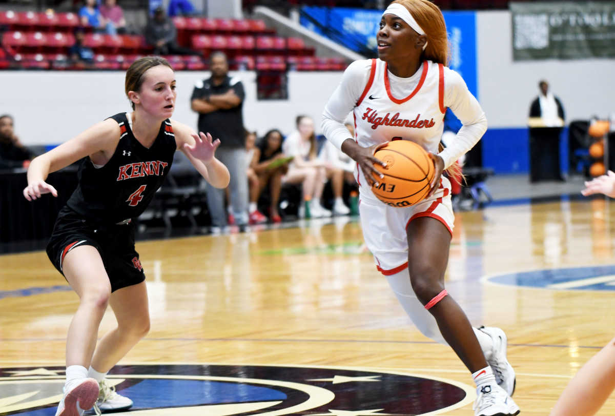 Lake Highland Prep guard Eleecia Carter drives to the basket during the FHSAA Class 4A girls basketball state championship game at the RP Funding Center in Lakeland. She scored 10 points, including a 6-for-6 performance from the free throw line.