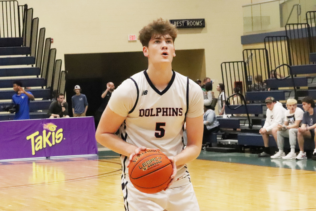 Sean Cusano, a 6-foot-9 Chattanooga University commit, lead the Dolphins with 18 points in the 3A final.