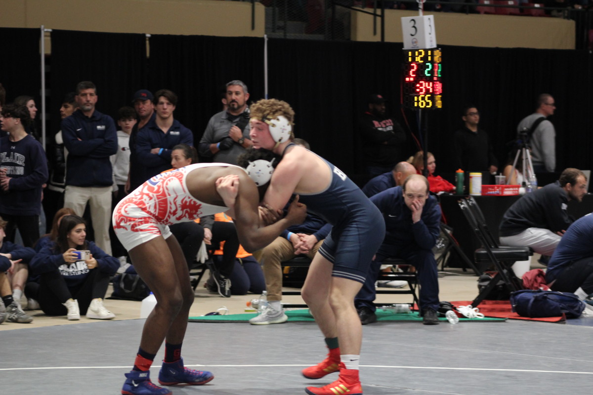 At 165, Blair's Peter Snyder (right) needed overtime to defeat Green Farms Academy's Xavier Giles II.