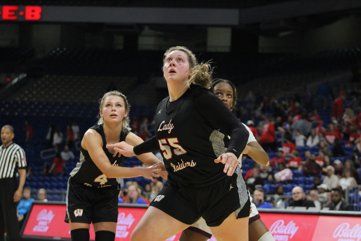 Winnsboro's Faith Acker boxes out a Fairfield defender in the UIL Class 3A state semifinals on March 4.