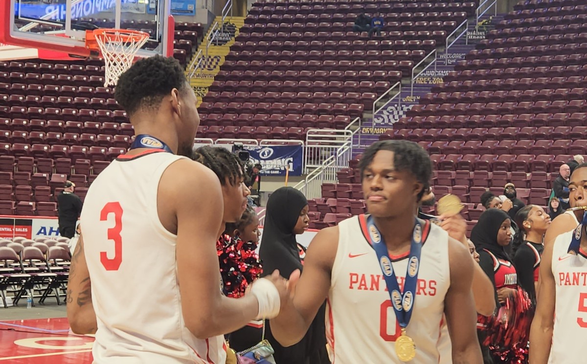 Justin Edwards (No. 3) and Ahmad Nowell (No.0) celebrate after Imhotep Charter won the 2023 Class 5A state championship