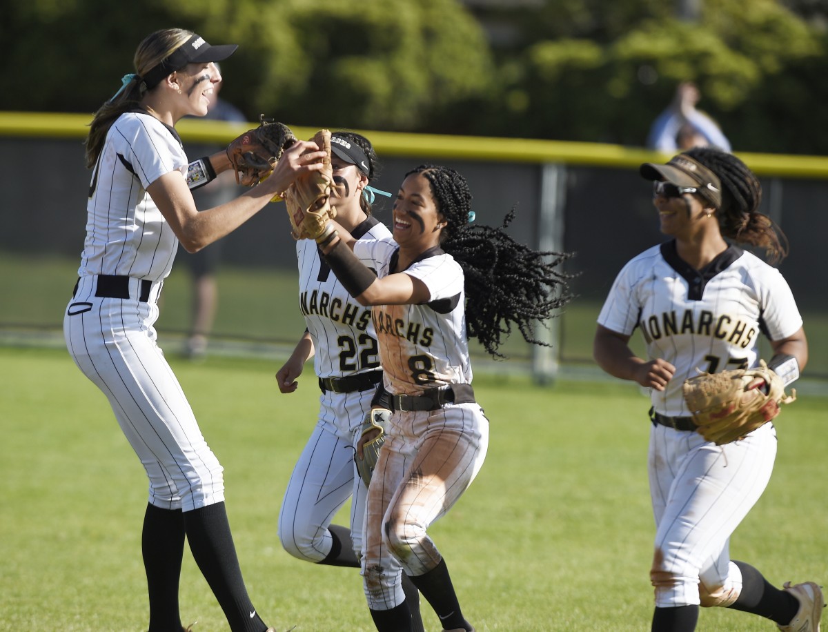McKenna Woliczko (left) loves to celebrate as much as she hates to lose, which isn't often. The combined records of Mitty's basketball and softball games to date in 2022-23 is 43-5. Photo: Eric Taylor