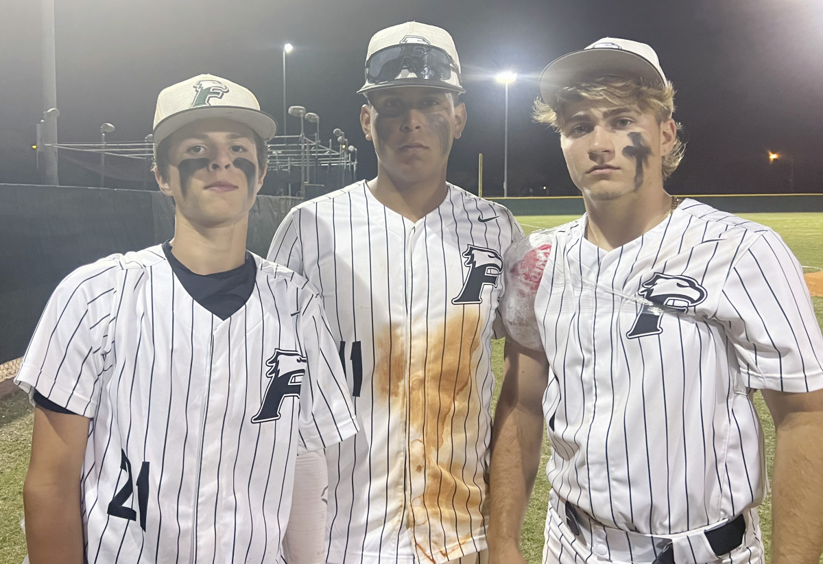 Flanagan’s Caden Corzo (left), Bruno Schafer (center) and Joey Roberts were the stars of their team's 6-1 playoff victory over Cypress Bay on Monday.
