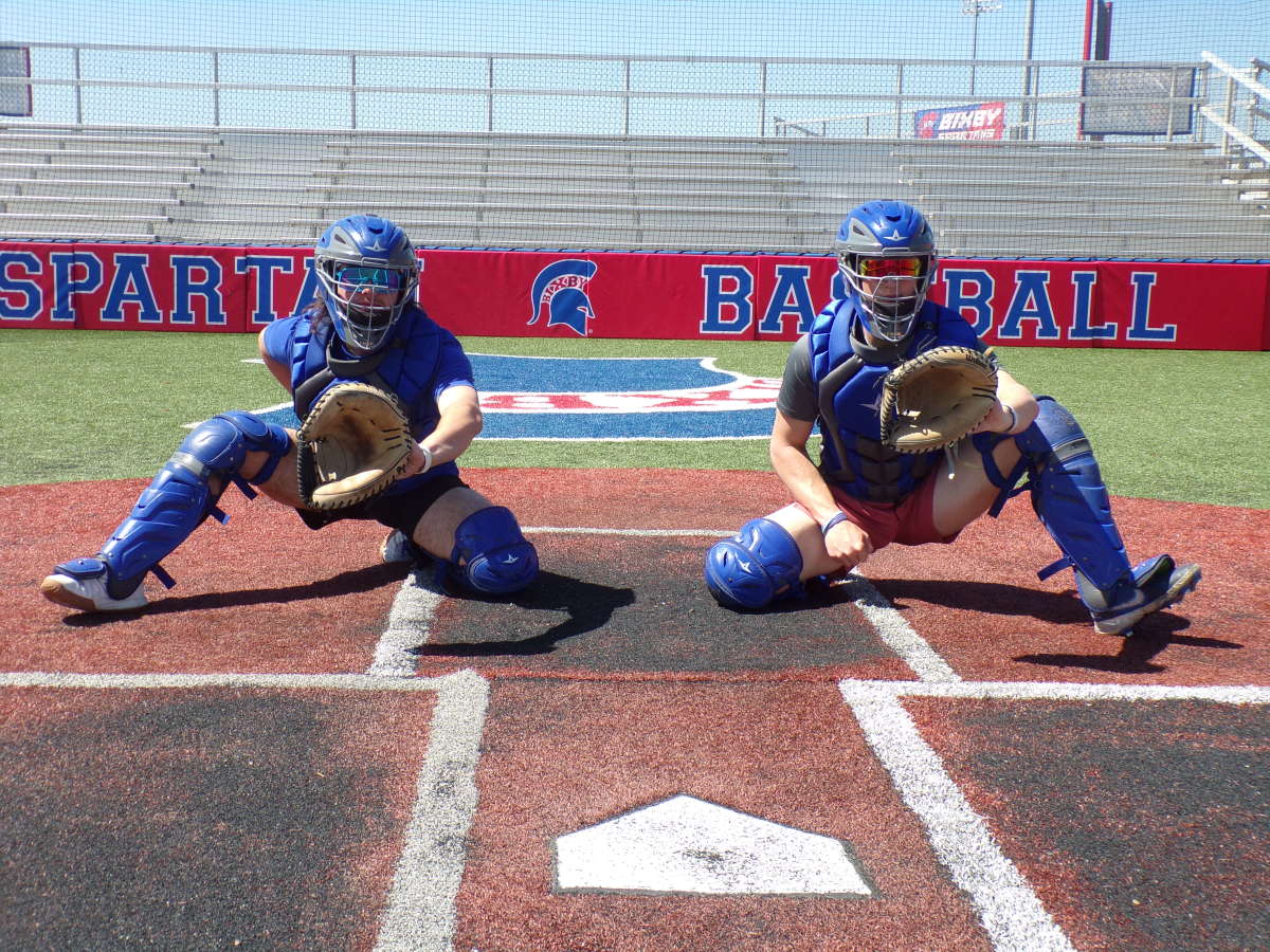 Bixby catchers Nathan Murphy (left), a Northeastern Oklahoma A&M signee, and Cooper Moore, a Kansas signee, have impacted the Spartans behind home plate this year. They are hoping for a state title.