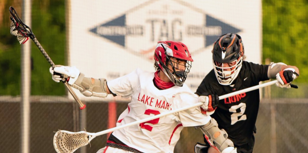 Lake Mary’s Caden Harshbarger (2) scored a hat trick to lead the Rams to a 13-5 victory against Fort Lauderdale St. Thomas Aquinas in the Class 2A state championship on Saturday.