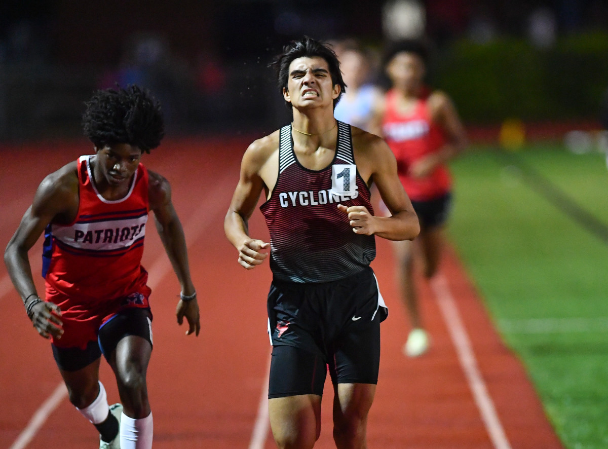 Russellville girl, boy runners steal show on home track at Meet of