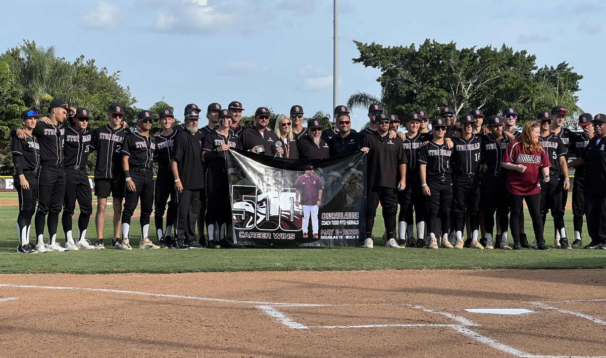 Prior to Saturday's playoff game, the Stoneman Douglas baseball community presented head coach Todd Fitz-Gerald with a banner commemorating his 500th career victory.