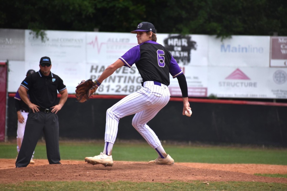 Winter Springs senior pitcher Mark Loubier bears down against a hitter in a recent game.