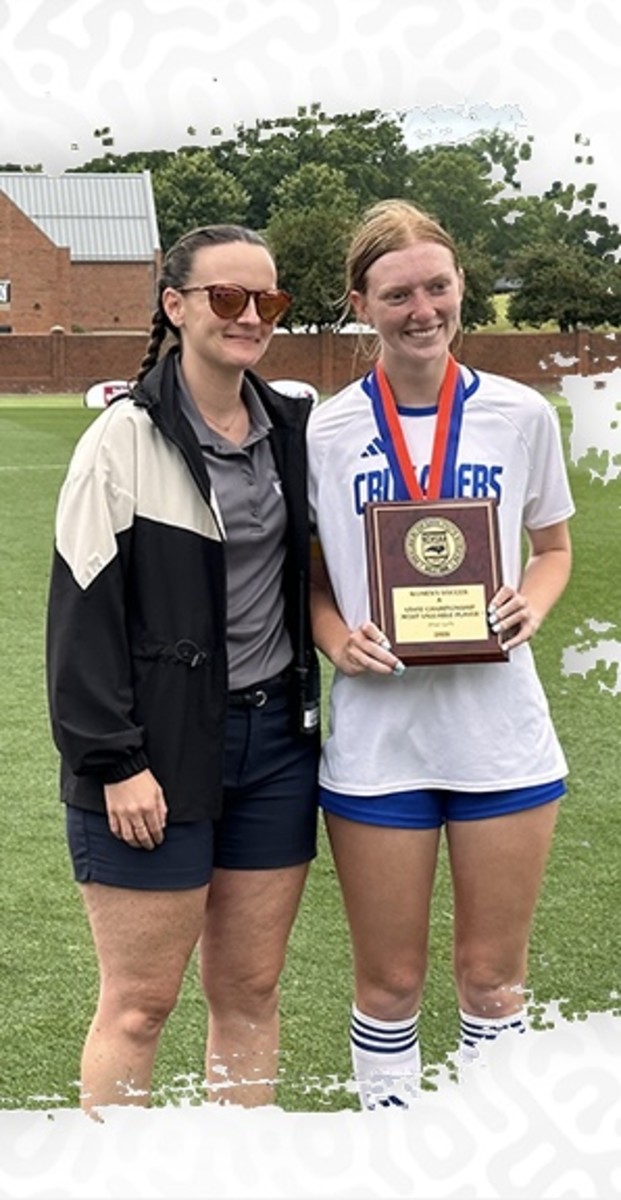 Riley Milligan (right) was named MVP of the NCHSAA 1-A girls soccer state championship.