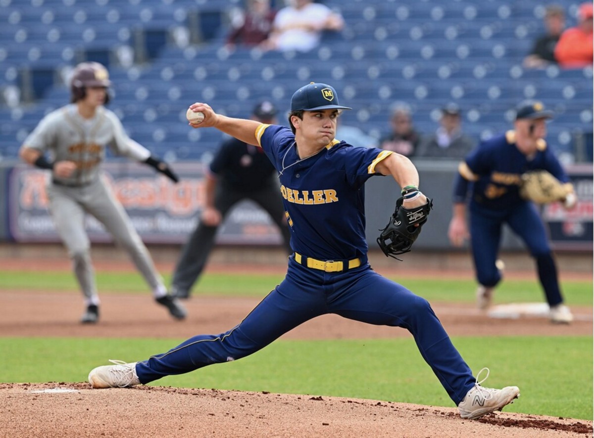 Archbishop Moeller pitcher Toby Hueber delivers a pitch during the OHSAA Division I state semifinals on Thursday morning at Akron's Canal Park. The Crusaders defeated Walsh Jesuit 2-0. (Photo: Jeff Harwell)