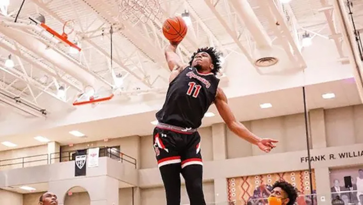 Cam Whitmore soars to slam home a dunk during his high school career at Archbishop Spalding. Now, he will look to make his mark with the Houston Rockets in the NBA.