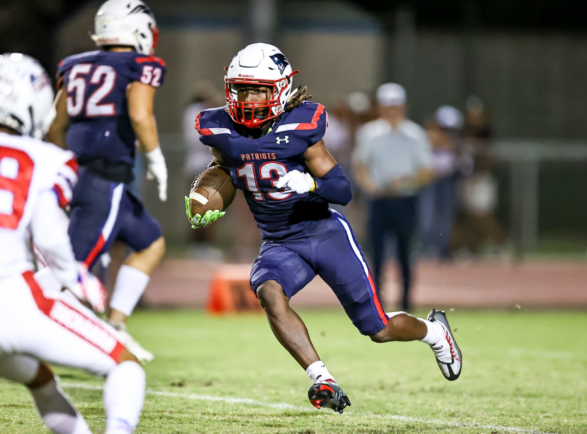 Kresean Krizzy (13) is one of Liberty's top playmakers and best defenders. Photo: Bobby Medellin. 