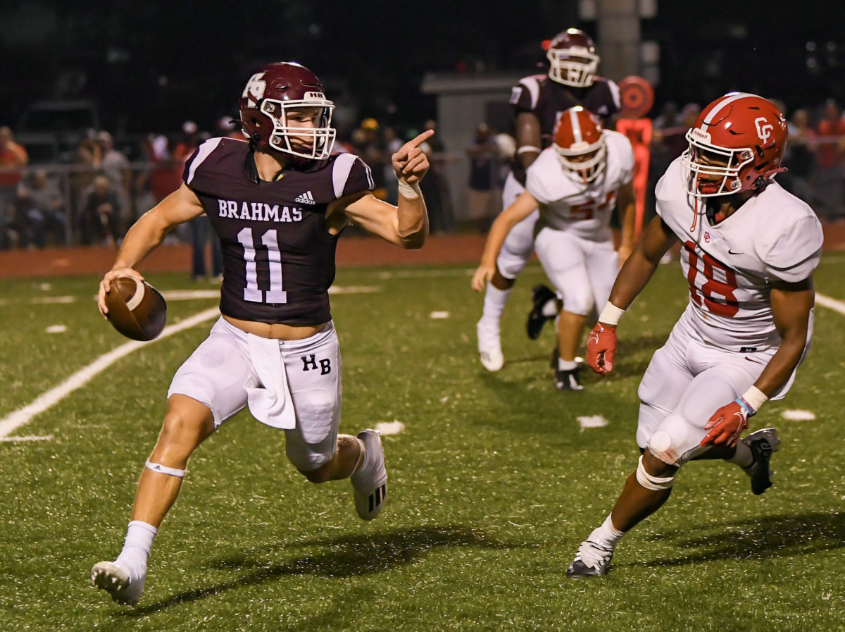 Columbus (red) improved to 7-0 following a wire-to-wire 35-13 road win over Hallettsville (maroon) on October 7, 2022 at Brahmas Memorial Stadium in Hallettsville, Texas.