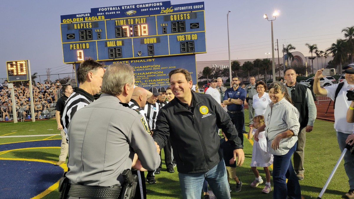 Florida governor Ron DeSantis assisted getting lights install at DeSoto County High School