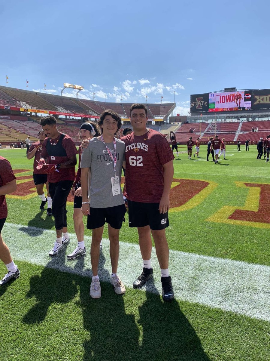 Ames High School senior quarterback Dallas Sauser (left) played two seasons of high school football with his older brother Dodge, who is now an offensive lineman at Iowa State. 