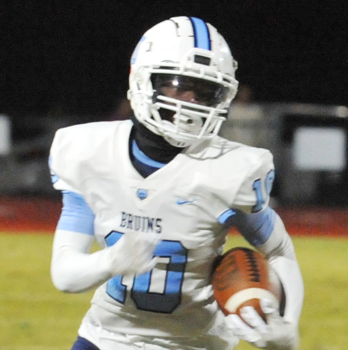 South Florence wide receiver Evin Singletary runs after catching a pass against North Myrtle Beach.