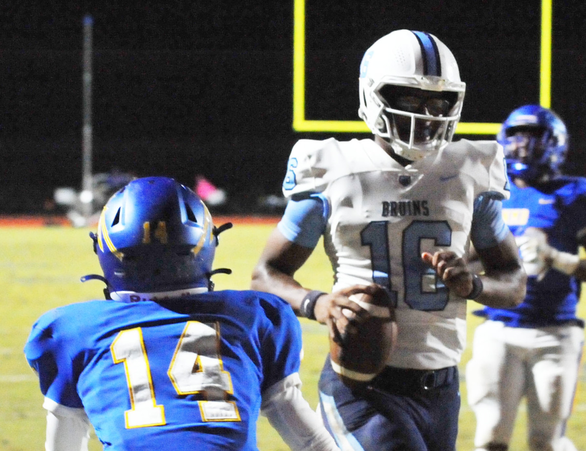 South Florence quarterback LaNorris Sellers scores on a 13-yard touchdown run against North Myrtle Beach. He also threw for three touchdowns and racked up 354 total yards.
