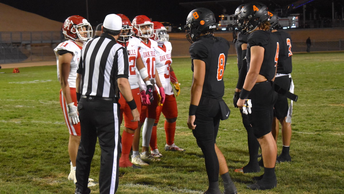 Oak Hills and Apple Valley shook hands before Friday's High Desert showdown, but not after. Photo: Lance Smith.