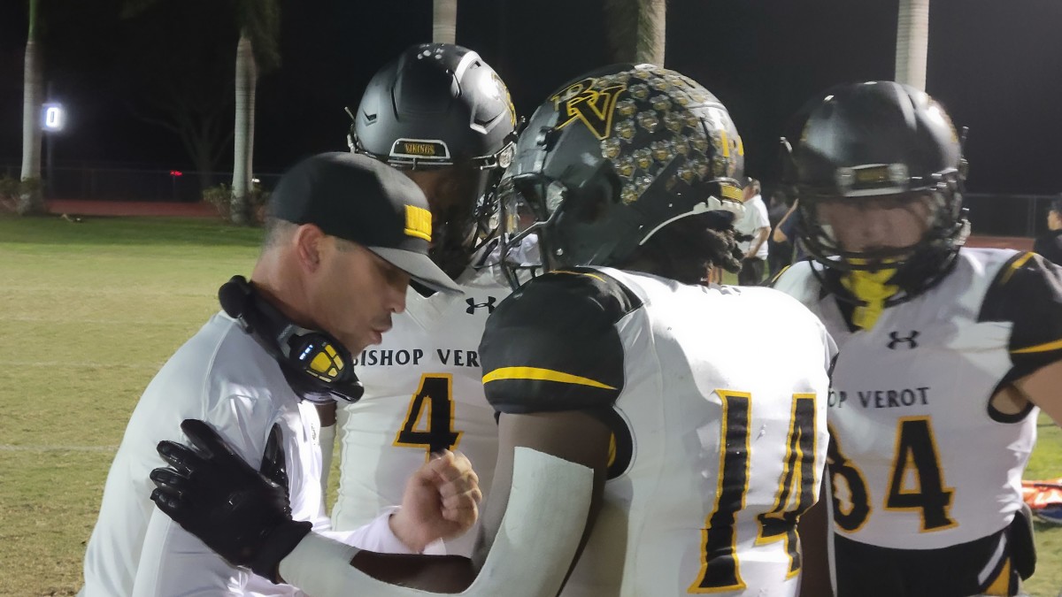 Bishop Verot coach Richie Rode emphasize a point to his offense during the Vikings' 57-10 rout of Estero, Friday night.
