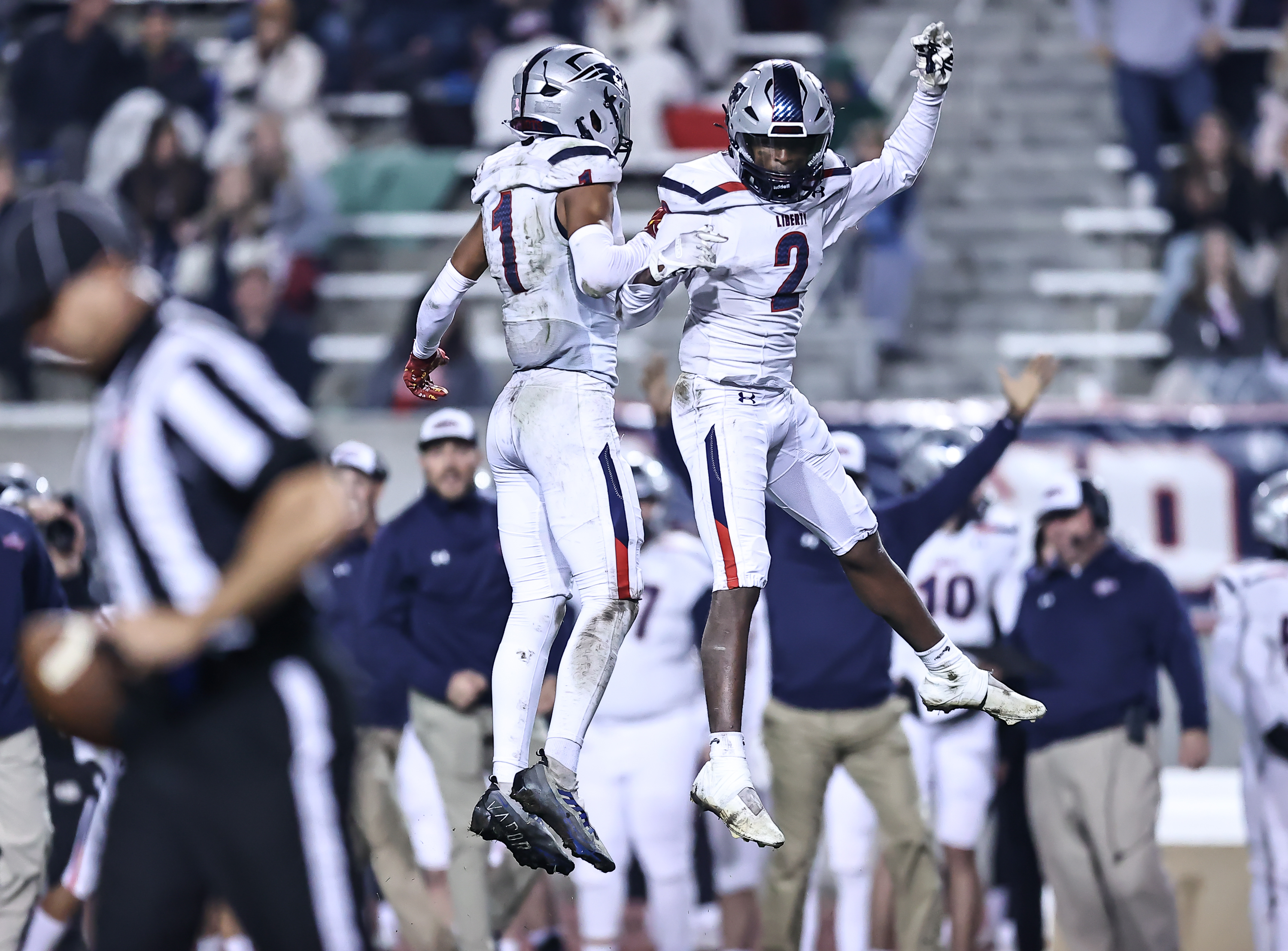 Xander Chisolm (1) and Christian Edwards (2) enjoy a Liberty moment. Photo: Bobby Medellin